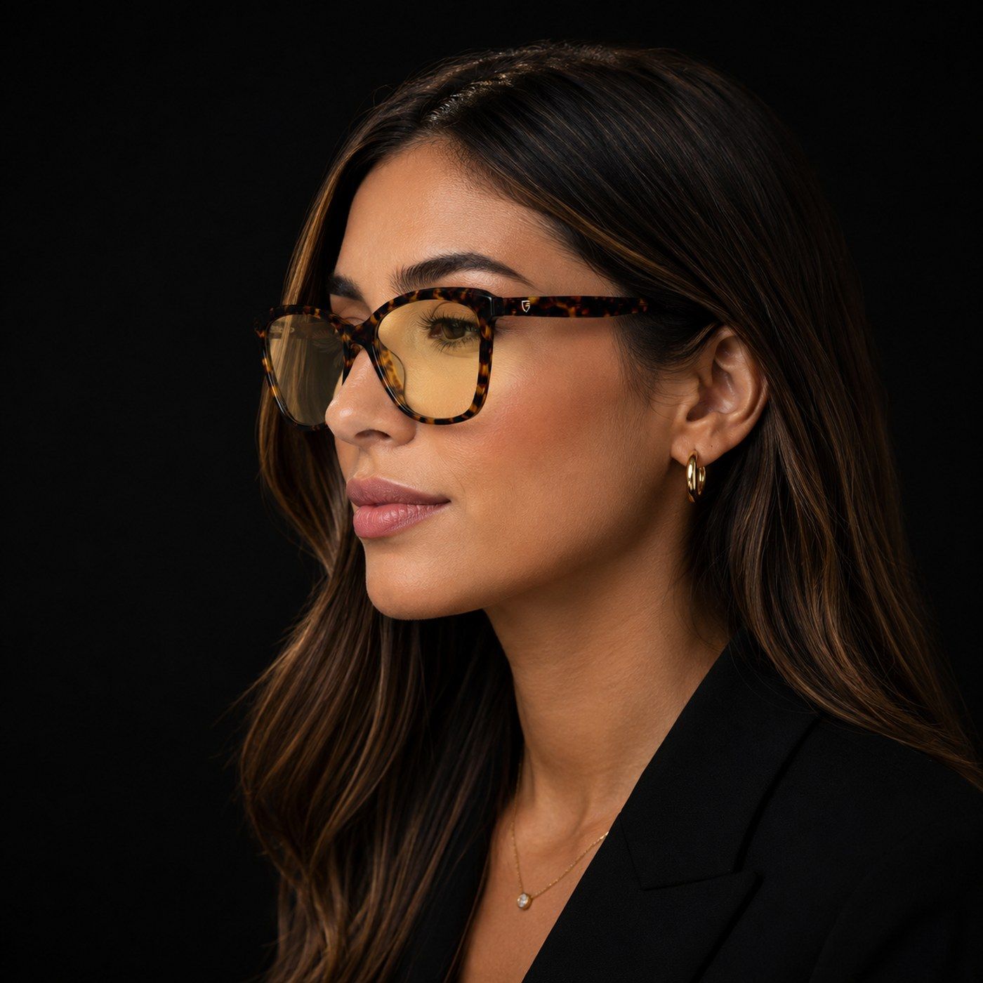 Women's Collection acetate frame with polished gold temple engraved “EYEGIS · LVR-T-CL” — front view